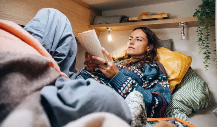 Sunlight VAN V60 2 Berth Motorhome Reading In Bed